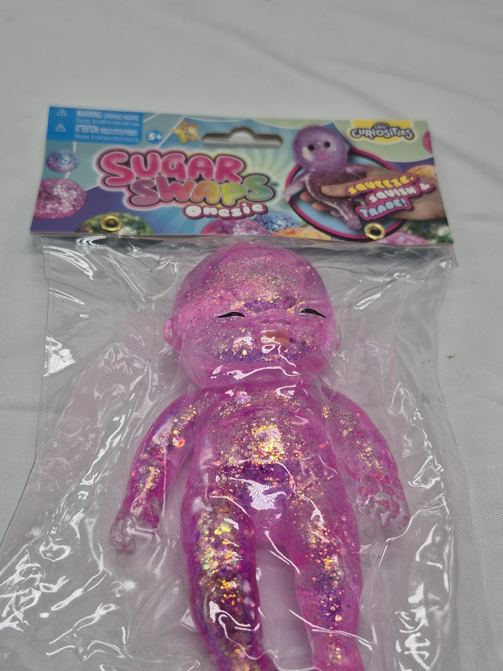 Pink Glitter Onesie Squeeze Toy